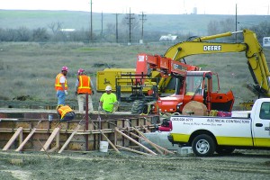 (Dean Brickey) Contractors work on a foundation for one of six modular structures at the site east of McNary for an Amazon data center. Property owner Vadata of Seattle has applied to annex the property to Umatilla.