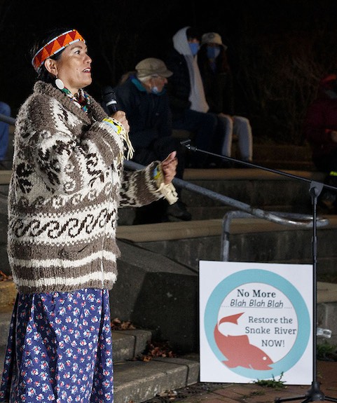 Alyssa Macy, CEO of the Washington Environmental Council and Washington Conservation Voters, encouraged continued pressure on elected officials to find solutions that would enable removing dams on the Snake River to restore salmon habitat. Macy was among speakers at a vigil for salmon and orcas on the Bellingham waterfront Saturday, Nov. 20. (Jacquelline Allison photo)