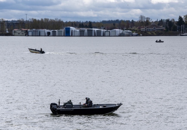 Anglers gather on the Columbia River on Tuesday, as seen from Waterfront Park.(Taylor Balkom/The Columbian)