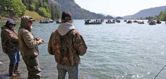 Fishing for Columbia River salmon from the bank and from a boat are both popular activities in the Pacific Northwest.