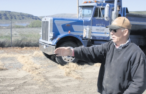 (Matthew Weaver photo) Central Ferry, Wash., rancher Walter Riley indicates a place on his property where U.S. Army Corps of Engineers land runs up against state deeded land and his own property the morning of April 22. Riley is one of many Whitman County ranchers along the Snake River hoping to continue using corps land for their cattle operations.