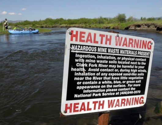 A sign on the Clark Fork River near Deer Lodge in 2009 warns the public about hazardous materials that polluted the river from mining and smelting operations in Butte and Anaconda. The Environmental Protection Agency has supervised multiple cleanup projects on the Clark Fork from Anaconda to Missoula.
(photo Tom Bauer, Missoulian)