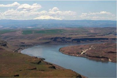 (Rick Bowmer) The Columbia River winds its way near the John Day Dam east of The Dalles.