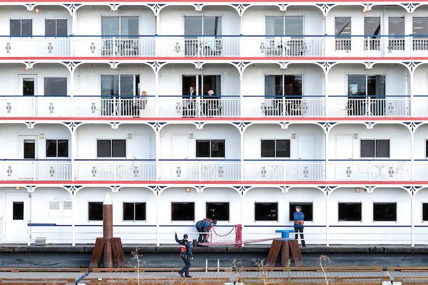 In this October 2019 file photo, crew members of the American Pride, a riverboat cruise ship, work on docking the huge vessel along the Snake River at the Port of Clarkston. What kind of economic impact do visiting cruise ships make in the Lewiston-Clarkston Valley? A study is being planned that is expected to quantify that.