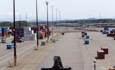 (Ross William Hamilton) Terminal 6, usually stacked full of containers, has relatively few boxes waiting for shipping abroad, as steamship lines bypass Portland because of labor disputes.