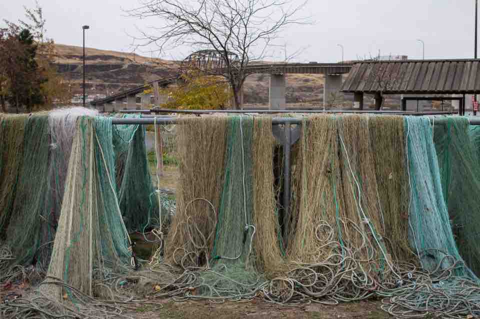 Tribal fishering nets dry on racks along the Columbia River at the Maryhill site. (Thomas Boyd photo)