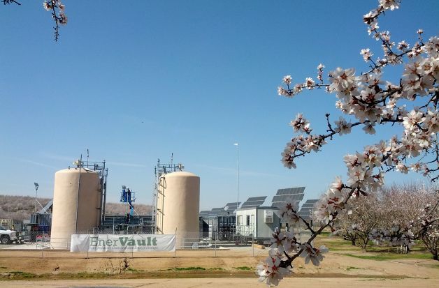The EnerVault flow battery's two electrolyte tanks store energy generated by a solar array in an almond orchard outside Turlock (Stanislaus County). Photo: Courtesy EnerVault
