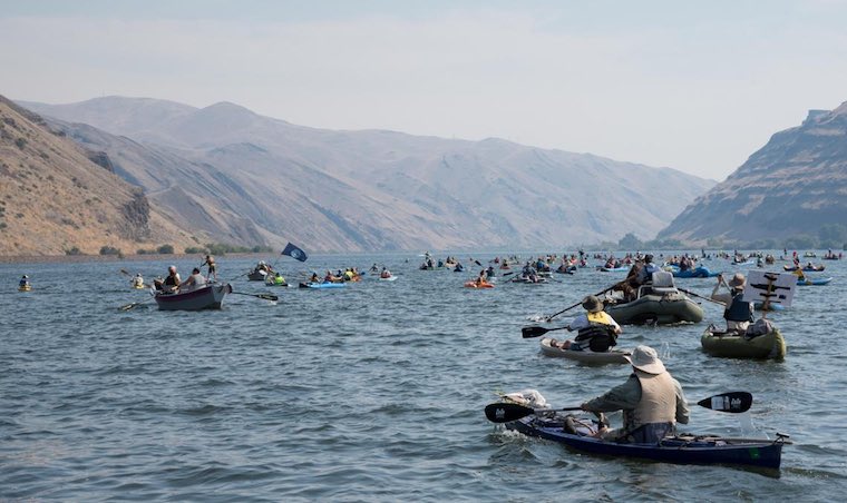 The annual Free The Snake Floatilla brought participants from the Seattle-area, Idaho, Spokane and elsewhere to advocate for the removal of the four Lower Snake River dams. (Eli Francovich / The Spokesman Review)