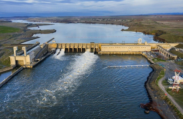 An aerial view of the Ice Harbor Dam near Pasco, looking east up the Snake River, on April 5, 2019. The reservoir behind the dam retains so much heat that the temperature exceeds the state standard for salmon survival in August every single day.