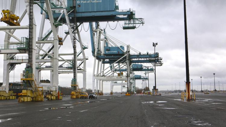At the Port of Portland, with shipping container service dropping to a fraction of what it once was, cranes sit idle and the docks are empty.
