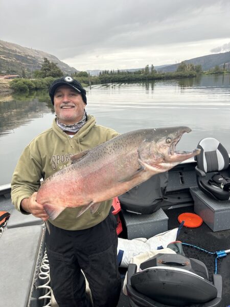 Steve )'Neal holds a large Fall Chinook he trolled up recently in the Columbia Gorge. (Knife Photo Contest)
