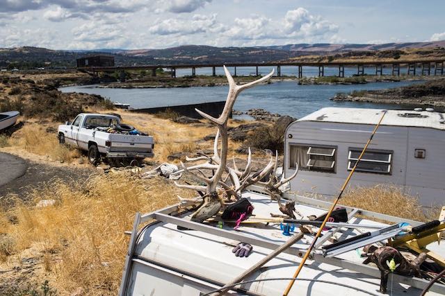 Lone Pine, located at the base of The Dalles Dam, is filled with the ramshackle housing of tribal members who make their living along the Columbia River. Many lived there before the dam was built. (Thomas Boyd photo)