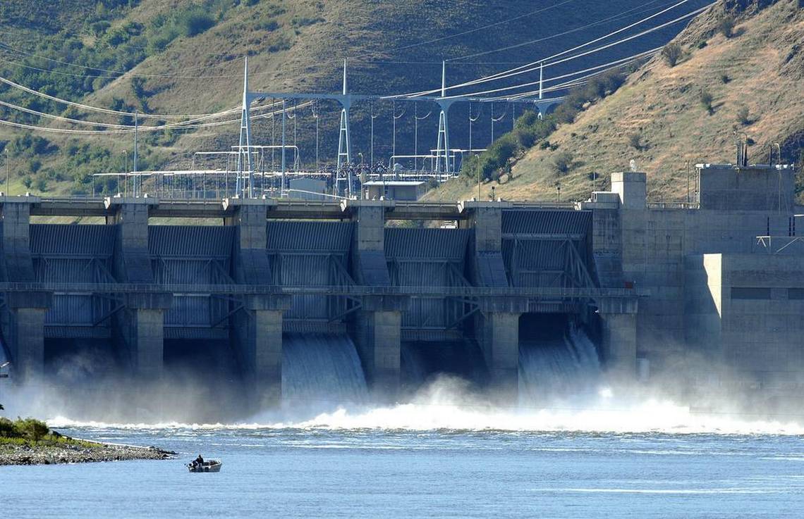 Water spills at Lower Granite Dam, one of the four dams on the lower Snake River salmon advocates have targeted for breaching. (Tri-City Herald photo)