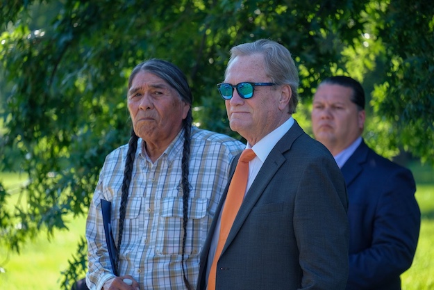 Nathan Small, chairman of the Shoshone-Bannock Tribes' Fort Hall Business Council, stands next to his former high school classmate, Rep. Mike Simpson, R-Idaho, at a rally outside the U.S. Capitol on July 14, 2022. The event was organized by Northwest tribes in support of breaching the Lower Snake River dams to help restore salmon runs. (Orion Donovan-Smith, The Spokesman-Review)