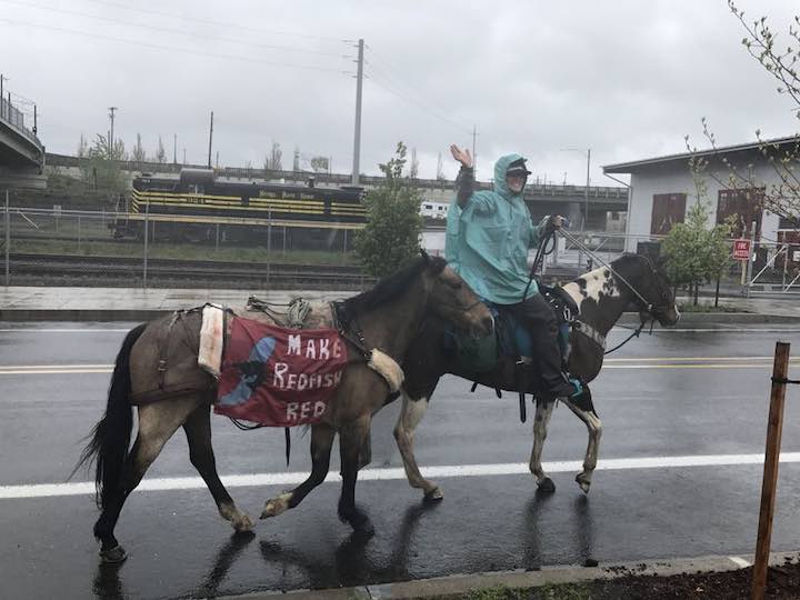 Three Idaho women road their horses through downtown Portland on April 24, 2017, part of a 900-mile journey to raise awareness of the plight of salmon in Idaho. (Andrew Theen photo)