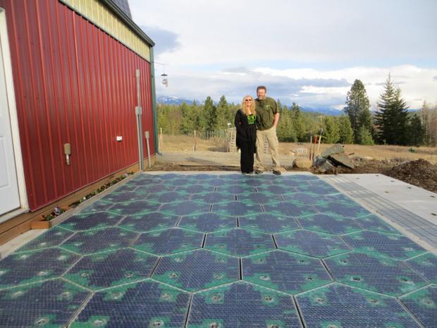 Solar Roadways co-founders Julie and Scott Brusaw stand by a demonstration pad of their solar roadway tiles.