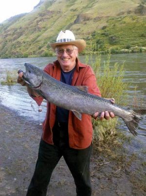 (Eric Barker photo) Paul Barker of Spokane displays a spring chinook he caught from the Clearwater River in 2011. A much smaller run will make springers much more difficult to catch this year.