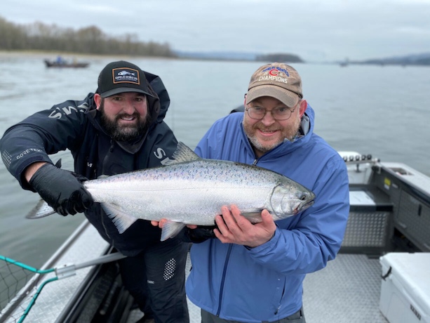 Guide Matt Eleazer with a client and a fine spring Chinook caught during last year's season. Prospects and projections for spring and summer salmon are up this year, and anglers could be looking at the best season they have seen in a number of years. (Photo courtesy of East Fork Outfitters)