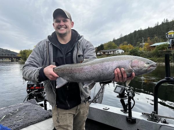 Luke Coots holds a nice hatchery B-Run Steelhead from the Clearwater River. He caught it in October while fishing with Buddy Kelly Colliton, a longtime fisherman here who termed Fall 2022 'A Fantastic Year for Big Steel' (COAST PHOTO CONTEST)
