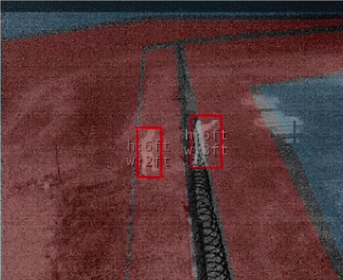 An infrared image shows two people, one appears to be pointing a gun. (Courtesy of FBI Portland)