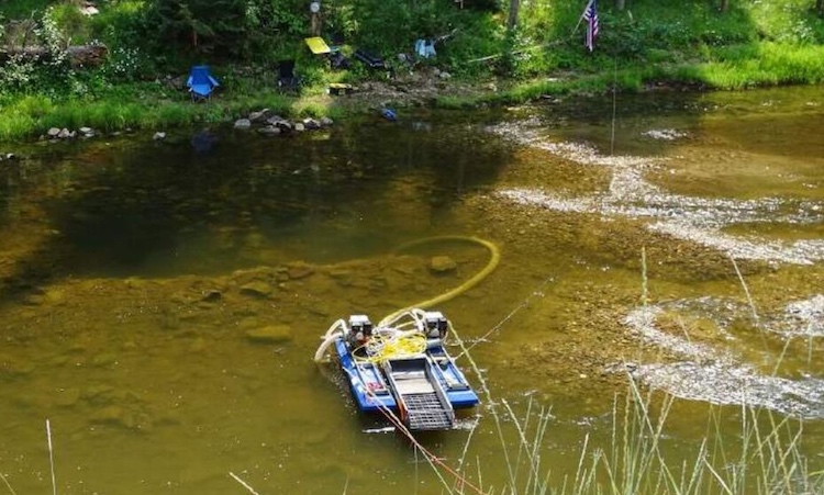 This Aug. 1, 2018, photo, submitted by the Idaho Conservation League to the U.S. District Court in Idaho, shows a suction dredging device used by Shannon Poe on the South Fork of the Clearwater River, the conservation group says. (Idaho Conservation League photo)