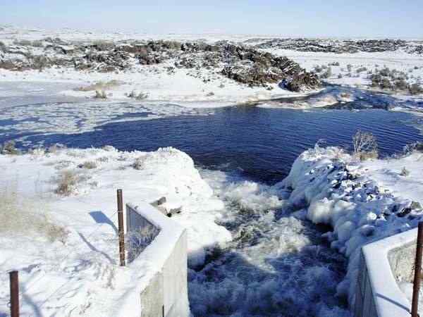 Winter aquifer recharge is conducted recently at American Falls Reservoir District No. 2's Milepost 31 recharge site. A work group has been assigned to draft a bill for the Idaho Legislature to implement an aquifer recharge credit system for the Eastern Snake Plain.