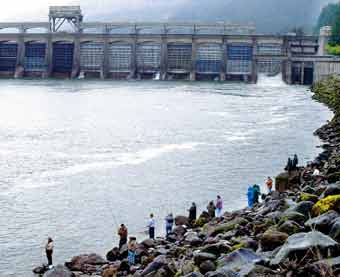 A hearing is set July 28 on a lawsuit by environmental and angling groups to block a plan to cut summer spills over Columbia and Snake river dams, including the Bonneville Dam on the Columbia.