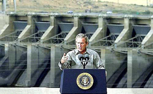 (AP Photo) President Bush speaks about salmon-recovery issues at Ice Harbor Dam near Burbank, Wash., Aug. 22, 2003.