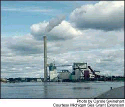 (Carole Swinehart) Coal-burning power plants, like this one near the U.S.-Canadian border in Michigan, emit pollutants that affect both nations.