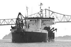 The U.S. Army Corps of Engineers' dredge Sugar Island is shown dredging the shipping channel in the Columbia River under the Astoria Bridge. A federal appeals court on Wednesday rejected an attempt by environmentalists to block the dredging of 103 miles of the Columbia River.