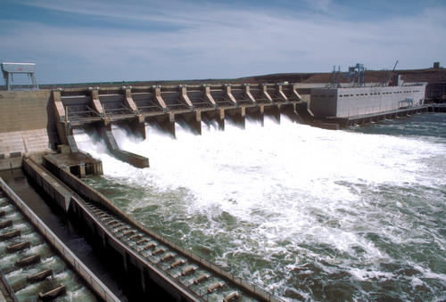 A federally owned operated dam complete with fish ladder to accomodate upstream migration of anadromous fish.