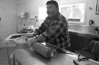 Kenny Jenks, a retired logger, owns the Smokehouse and Saw Sharpening Business in Orofino and expects to see a 40 to 50 percent boost in his business this year because of the good salmon season. Jenks would like the salmon runs to return to what they used to be, for the sake of the economy and for the sake of good fishing. 'I'm no environmentalist, but I like a free-flowing river myself,' Jenks said.