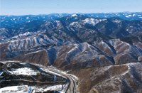 (Jesse Tinsley) A near record low snowpack in the Couer d'Alene Mountains and other ranges foretells trouble for salmon, irrigators and electricity production.