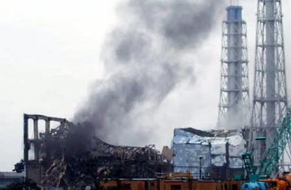 Black smoke rises March 21 from reactor No. 3 of Japan's Fukushima Dai-ichi Nuclear Power Station, where engineers have been working to fix disabled cooling systems