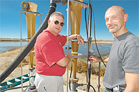 Ron Sheffield, left, and Keith Bowers are working on technology that takes dissolved phosphorus out of dairy lagoon wastewater.