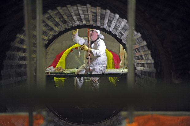 Crews working at the Columbia Generating Station are framed by the empty generator on Tuesday, May 3, 2011. The Tri-Cities area nuclear power plant is going through a planned outage for refueling for 78 days until June 15, 2011.