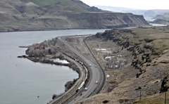 (Andy Sawyer) Celilo Village sits up against the cliffs along the Columbia River, fenced in by rail lines and Interstate 84 on the other side, between the village and the place where Celilo Falls used to be.