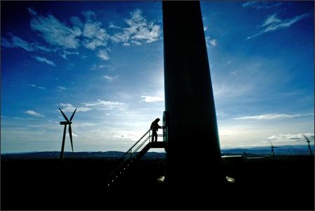 (Grant M. Haller)  Puget Sound Energy worker Tom Bensel enters a wind turbine at the Wild Horse Wind Project to check the operations computer inside the tower. The project is expected to serve about 70,000 customers.